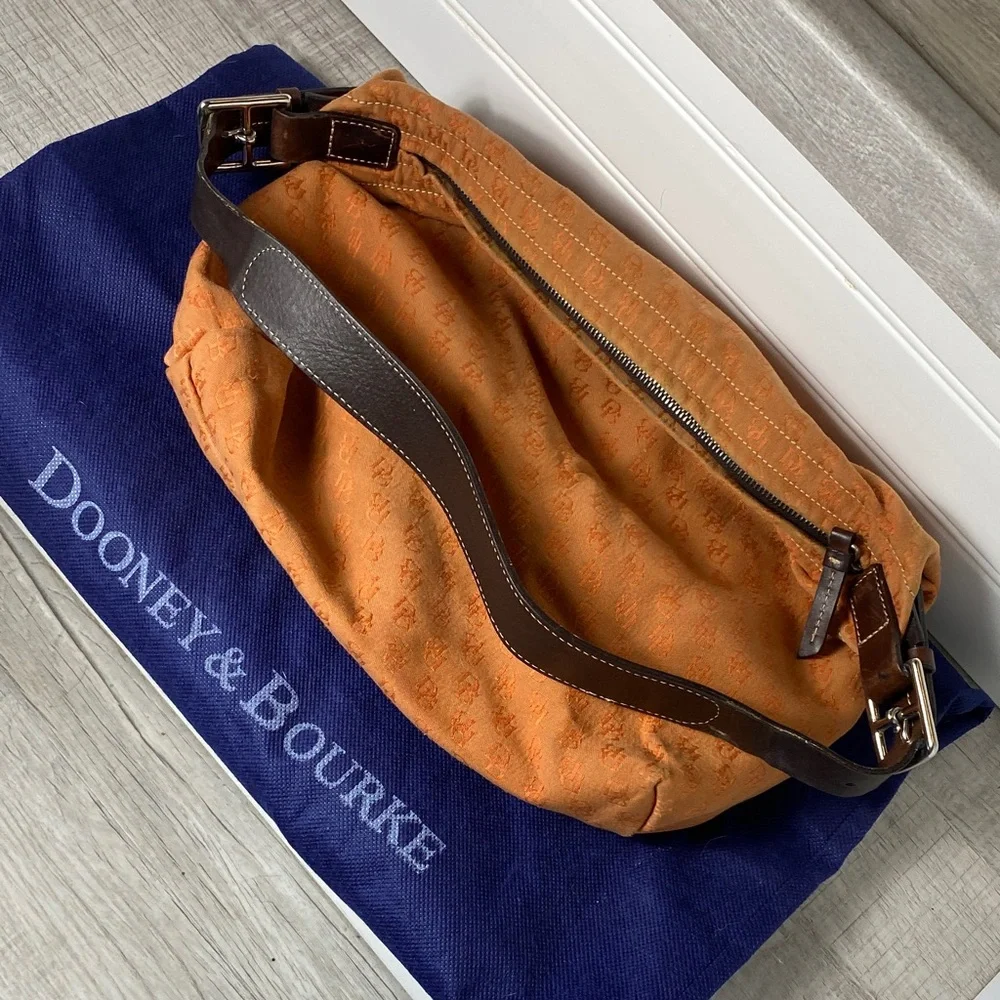 Dooney & Bourke Vintage burnt Orange over the shoulder bucket Bag